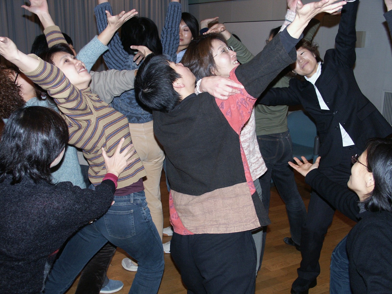 A group in Japan taking part in an expressive movement activity with Andy