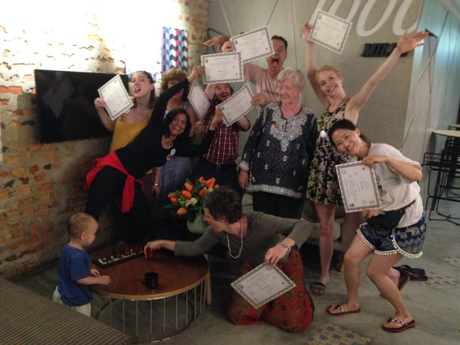 Sue and Andy with members of the first NDP in the Jungle cohort holding course certificates