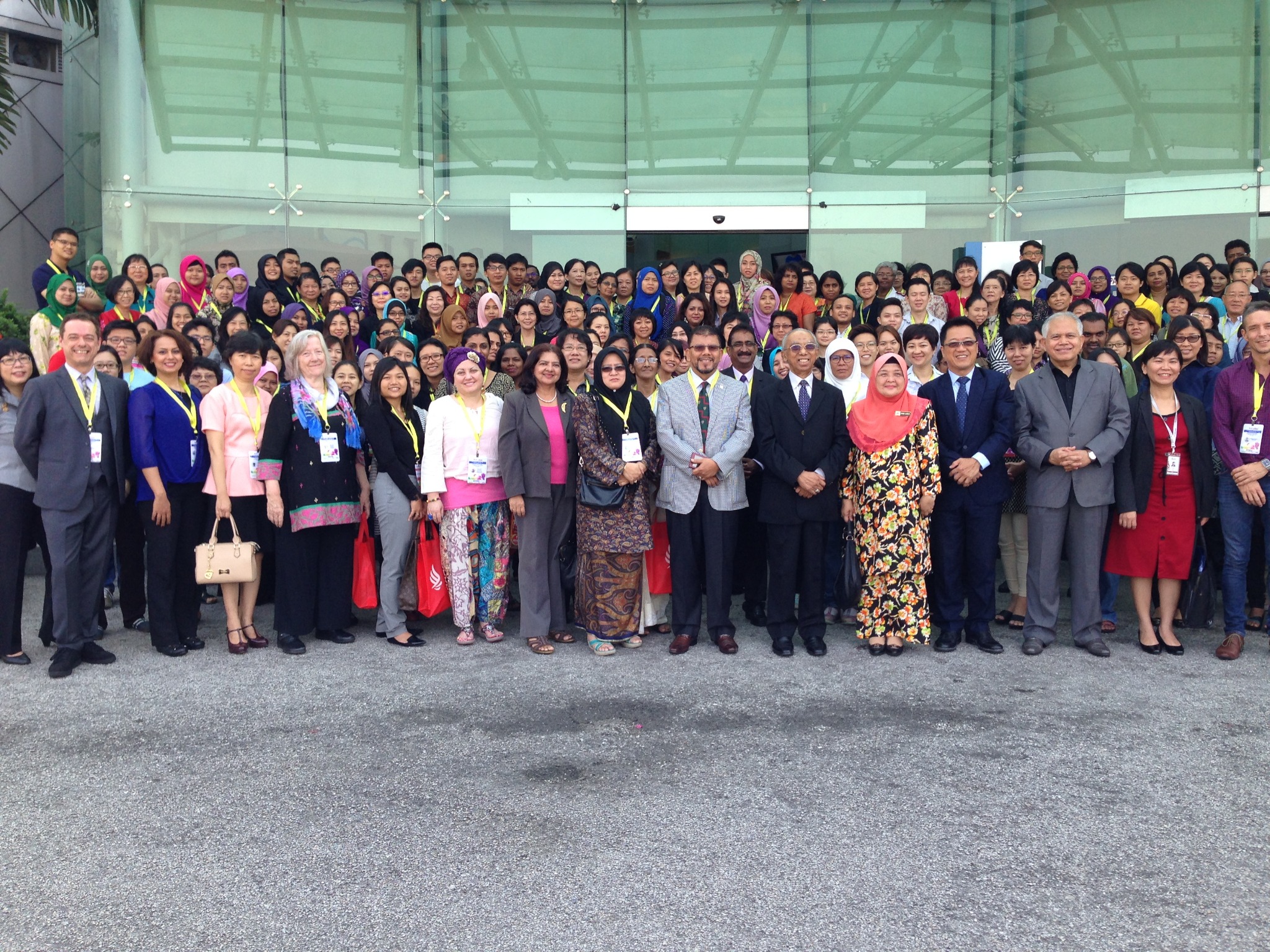Large international group gathered during the Transform With Action tour